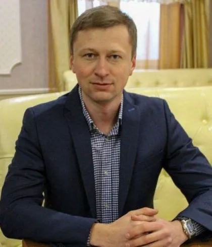 Vadym Ratynskyi, founder and head of the organisation — a man in a dark jacket, seated, looking at the camera